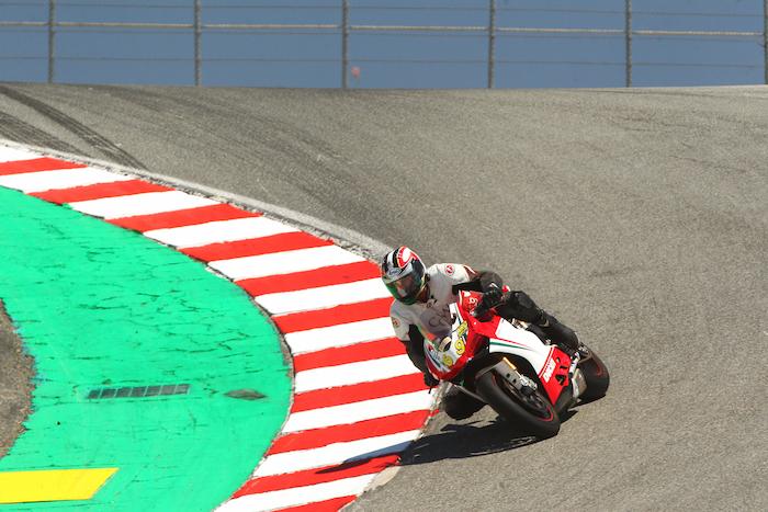 Partner George Choulos on the famous corkscrew at Laguna Seca raceway